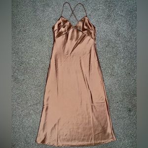 Pinkish silk fashionnova Dress worn once. Size large. Subtle Under Boob cutouts.